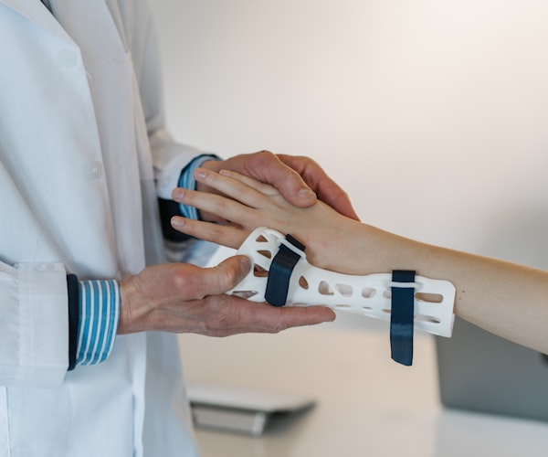 Physiotherapist guiding patient through rehabilitation